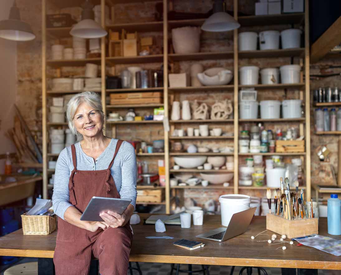 woman with tablet smiling