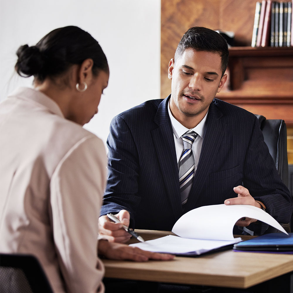 two people discussing a contract