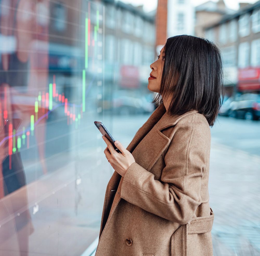 Agronomist holds tablet touch pad computer in the corn field