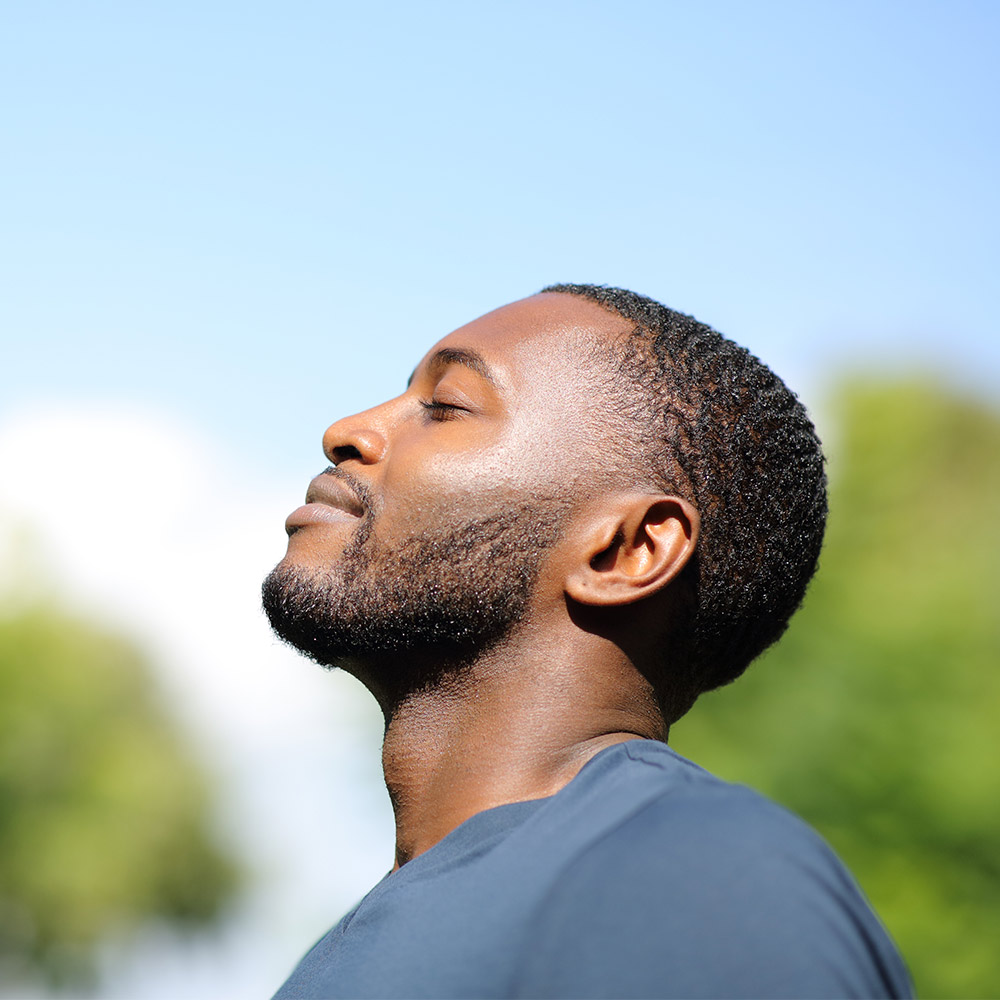 Man taking in the sunshine