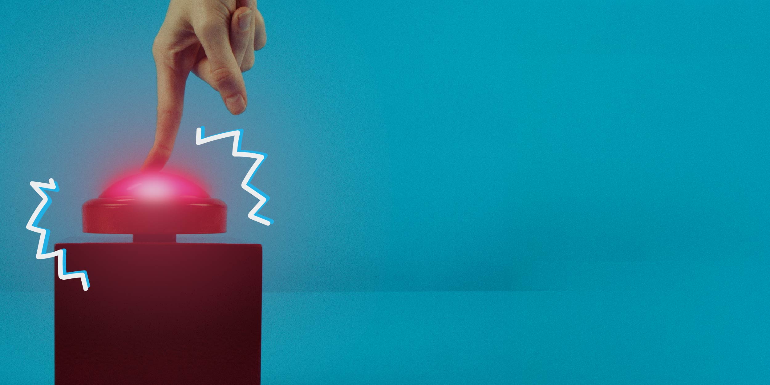 Hand pressing a red panic button