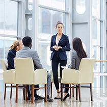 a group of people having a meeting