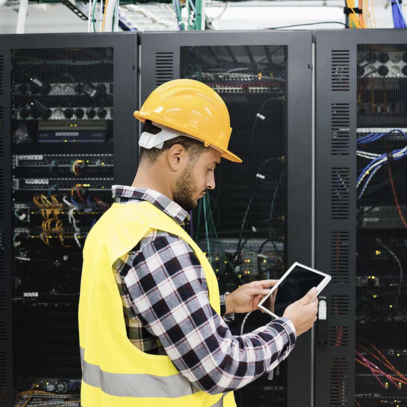 engineer looking at a tablet