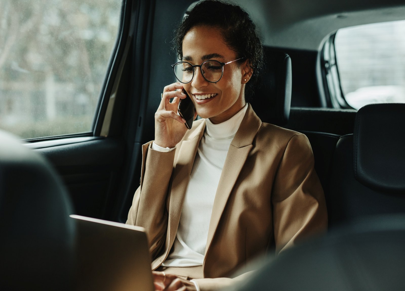 professional on phone in car