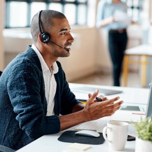 man speaking on headset