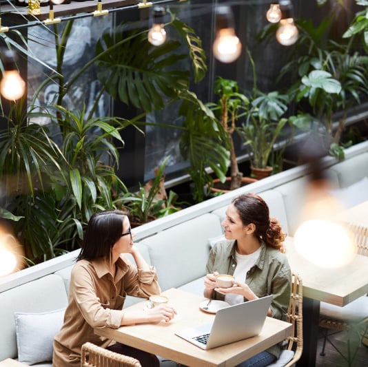 two people meeting outdoors
