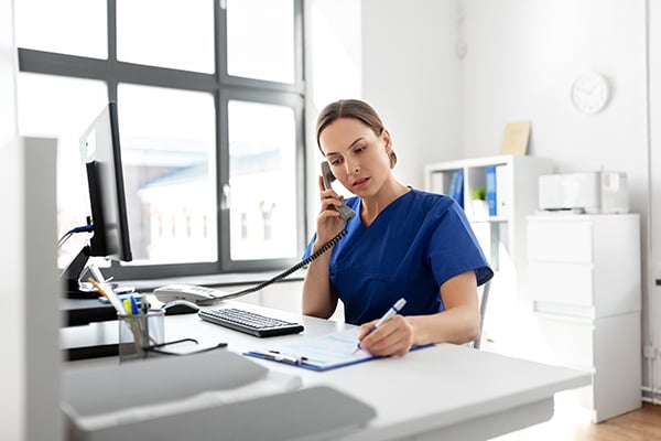 nurse calling patient