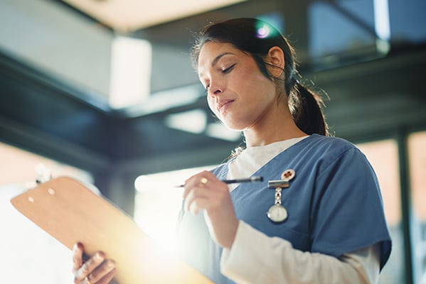 nurse with clipboard