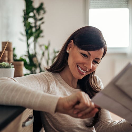 woman looking at advertisement