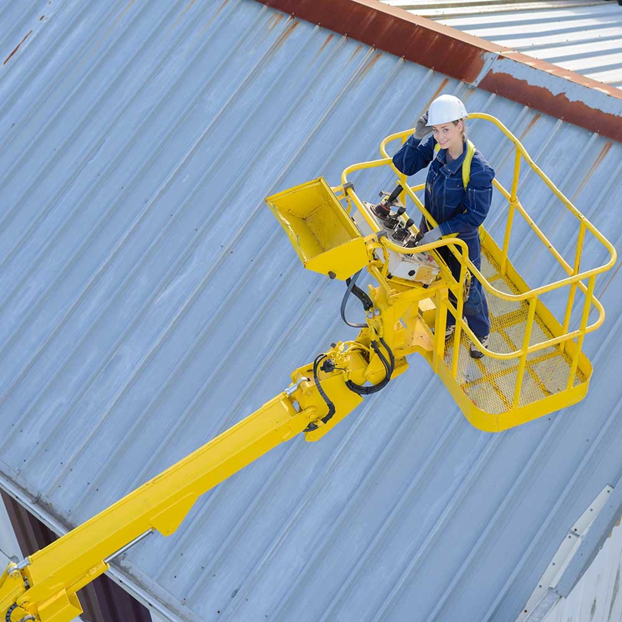 woman on bucket lift