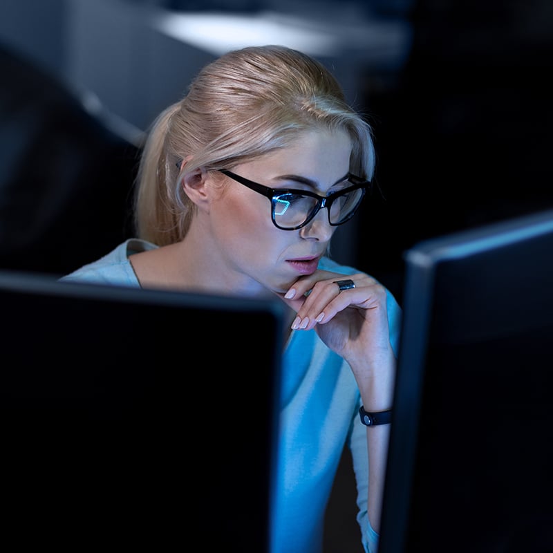 girl looking at computer screen