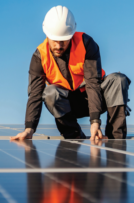 man-solar-panels