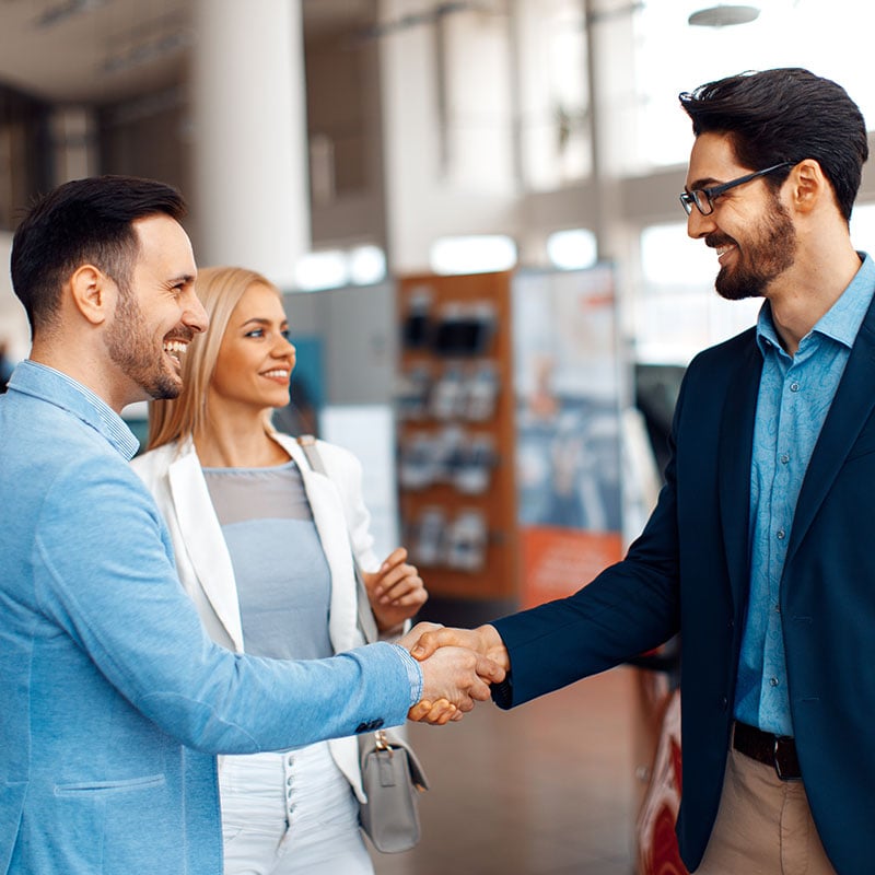 3 people at dealership