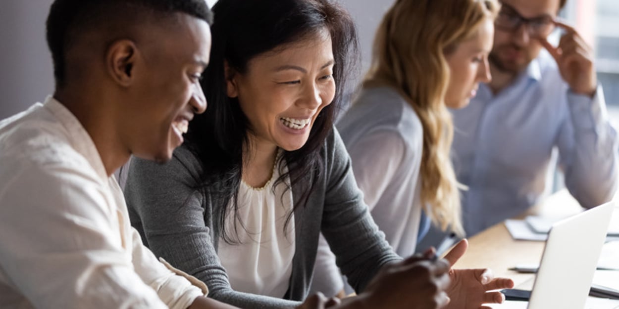 coworkers-collaborating-at laptop coworkers-collaborating-at laptop