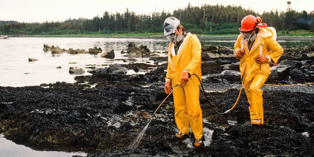 hazmat-spraying-rocks-on-beach