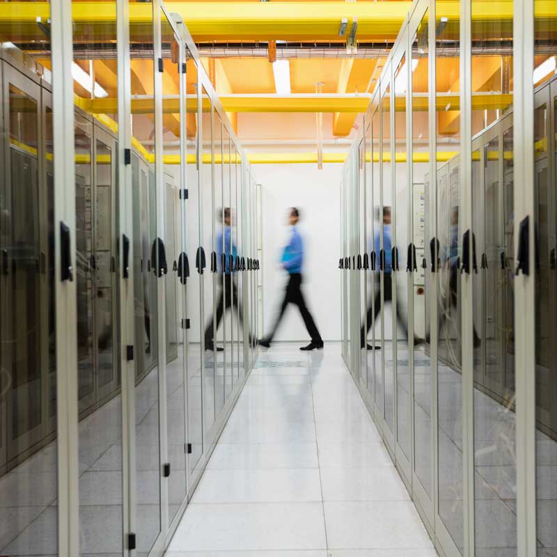 man-walking-in-datacenter