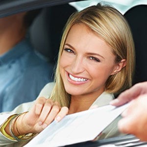 Woman renting car