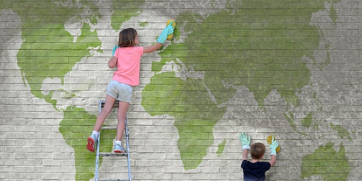 GettyImages-1180002190.FOR article graphic kids clean painted wall with globe.jpg