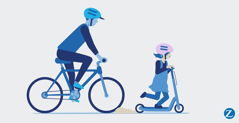 Ein Mann fährt mit einem Fahrrad und ein Kind am Roller | Zurich Connect Fahrradversicherung
