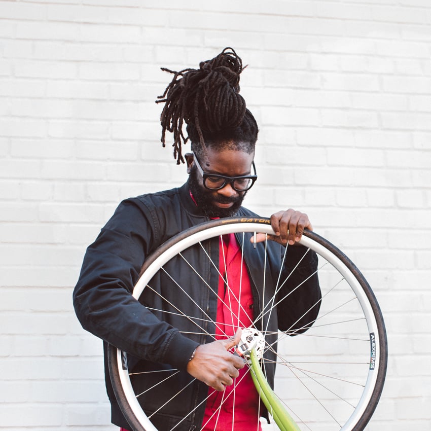 Man with a bike wheel