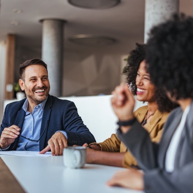 People having a meeting at a table