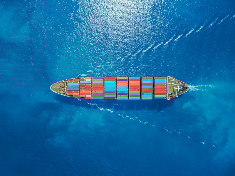 Aerial top view container ship Park for import export logistics in pier, Thailand.