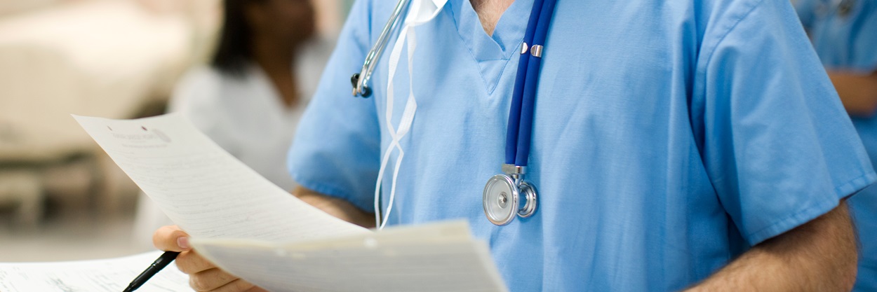 body of man with blue shirt doctor