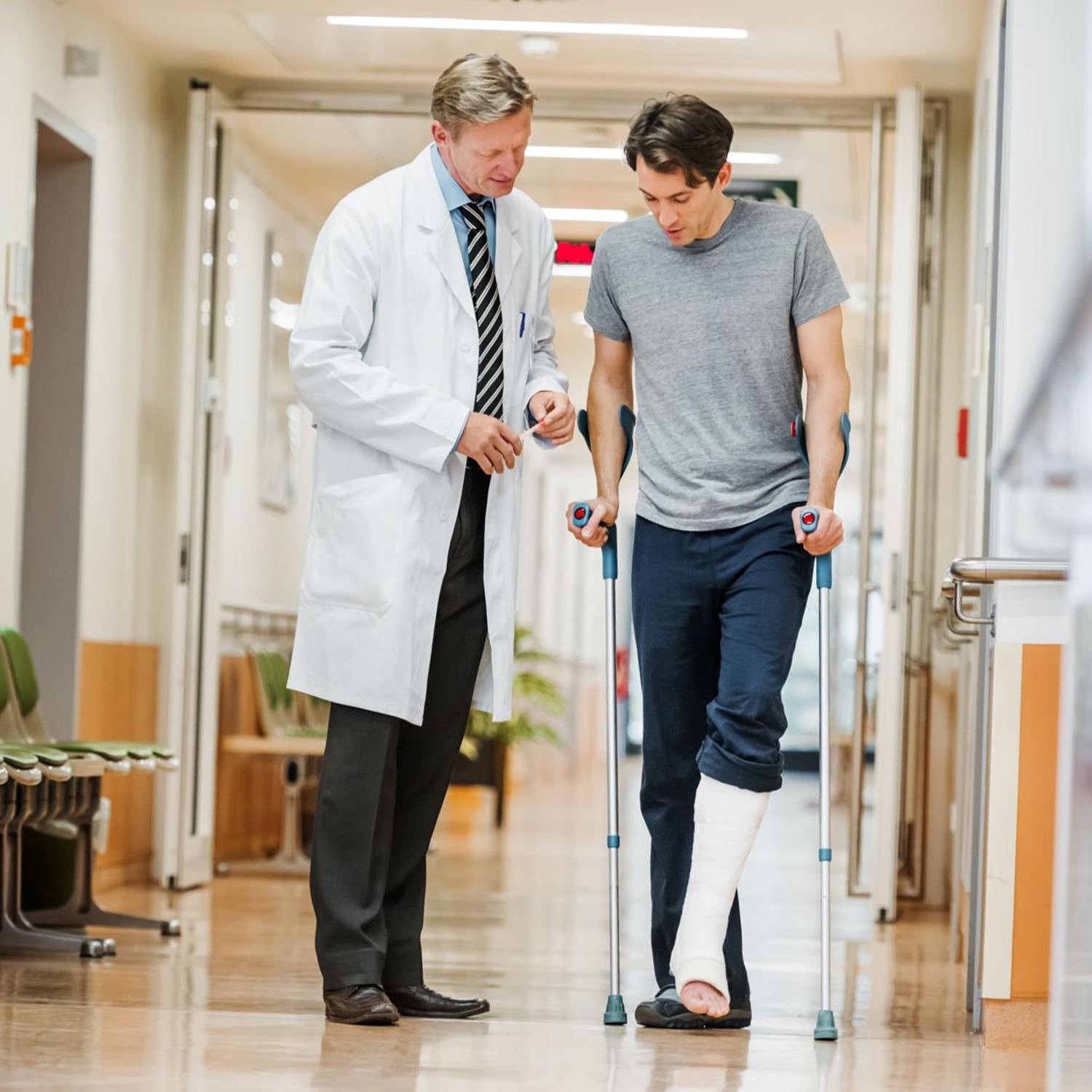 patient walking down the hospital hall