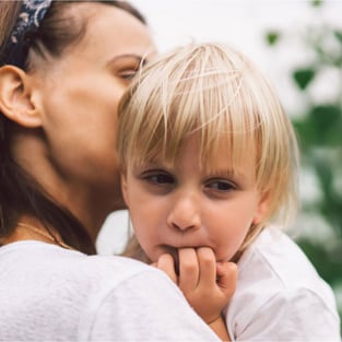 Mother holding her son small Family Insurance