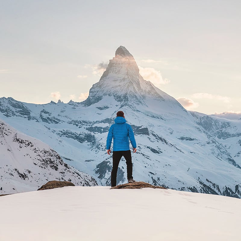 Man On Top Of Mountain