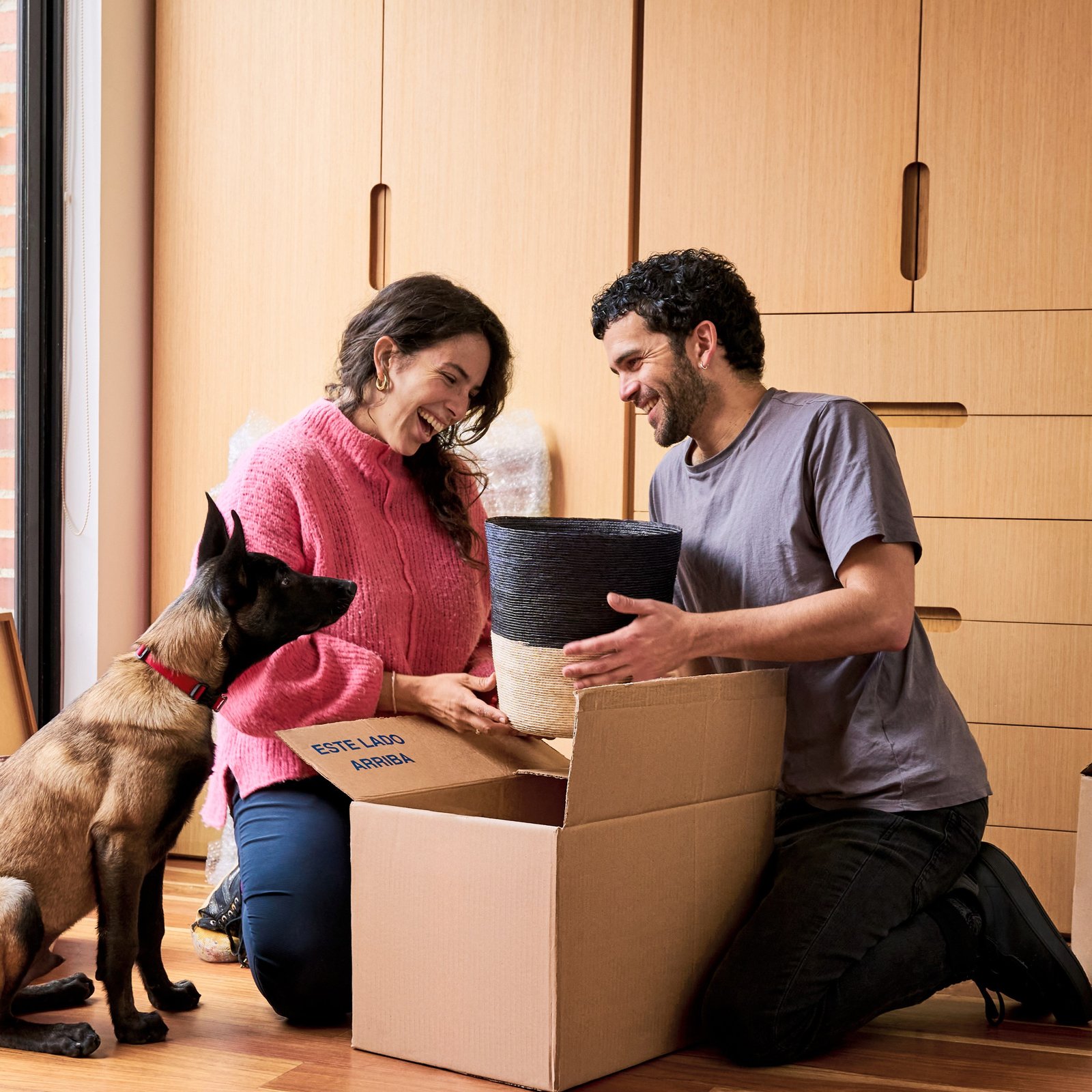 Couple with moving boxes