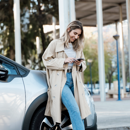 Women smiling looking at phone