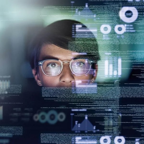 Digital data and analytics overlaying a person.
