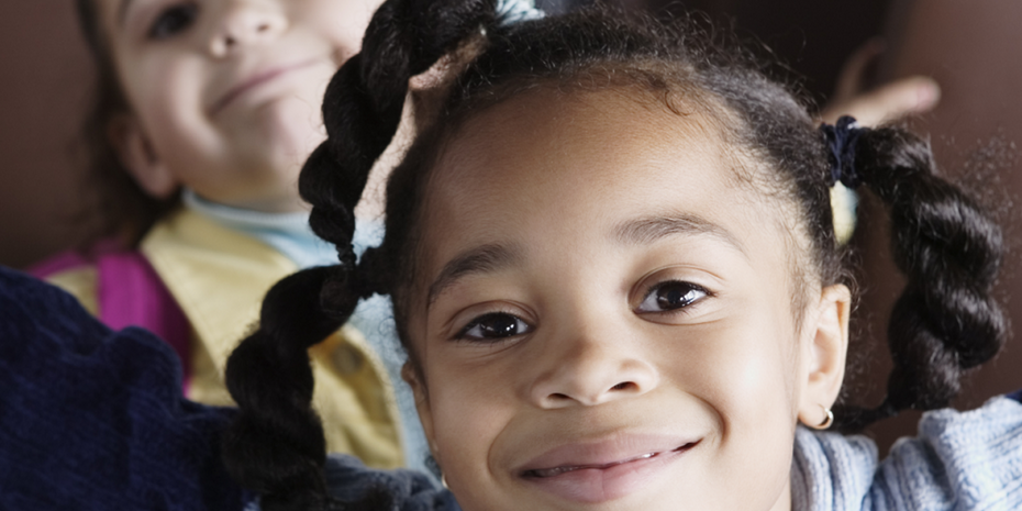 Little girl with black plaits for web