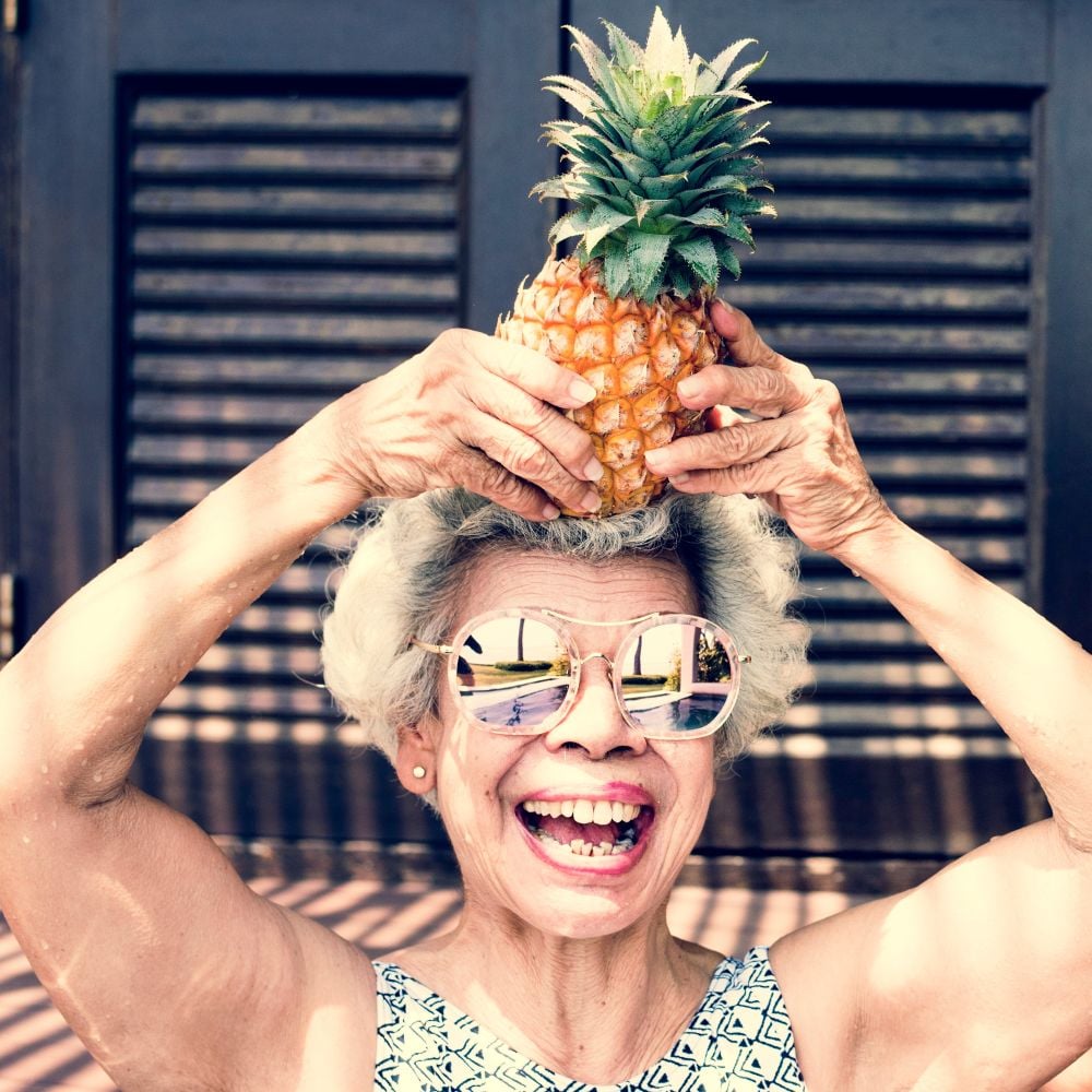 women with pineapple