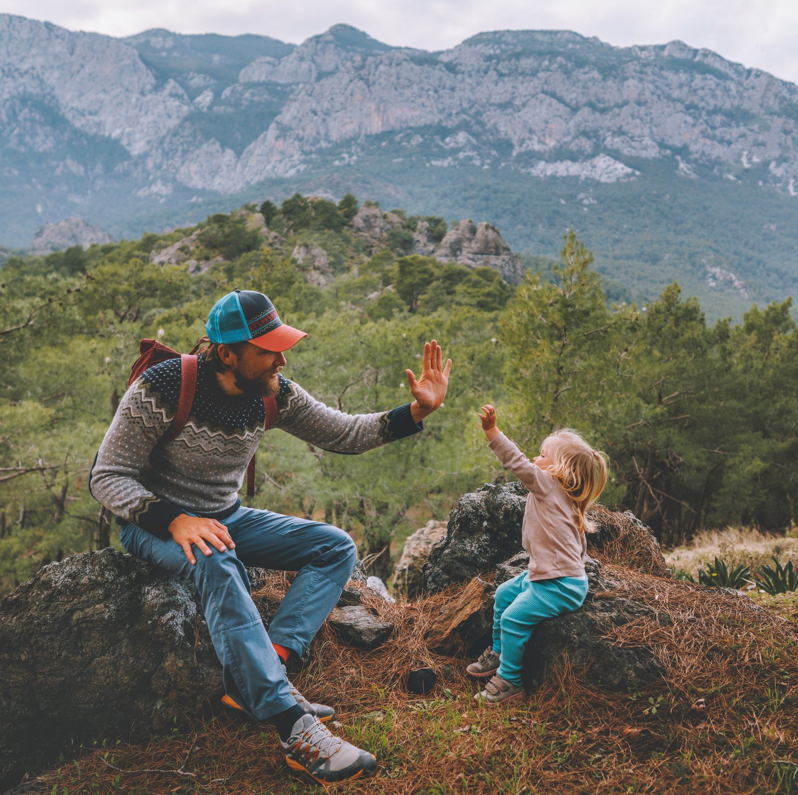 Father and son giving highfive