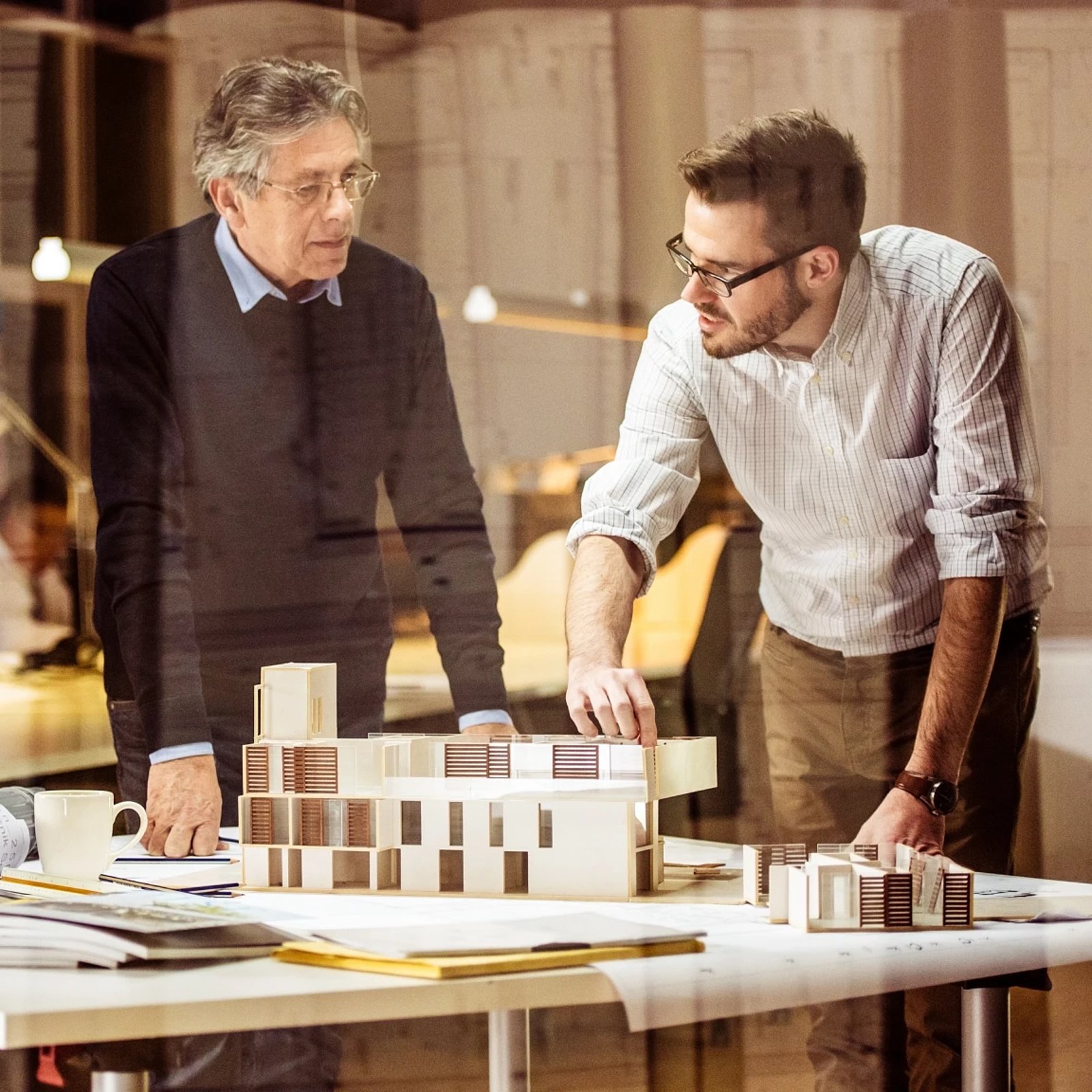 Two men discussing climate risk post-event recovery