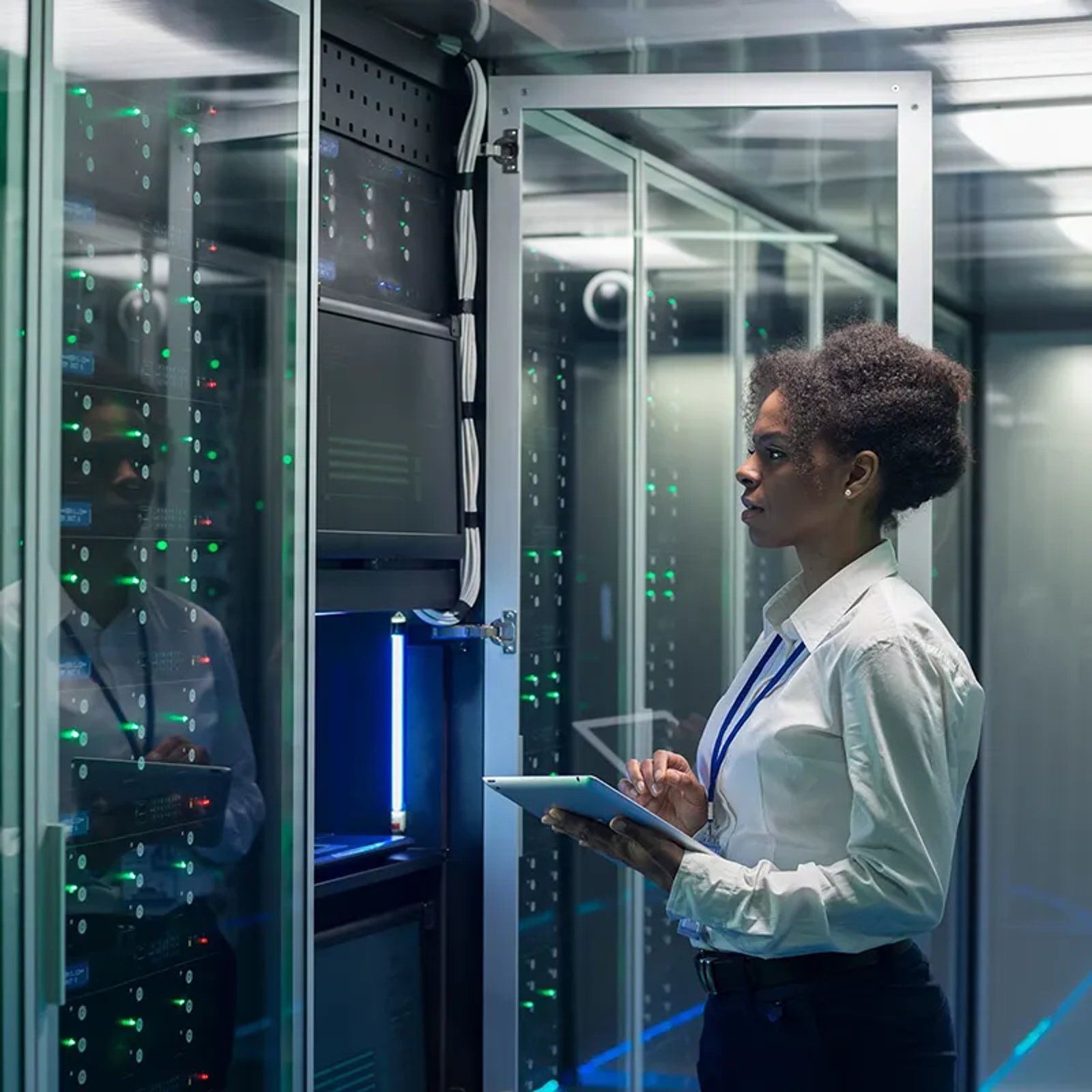 Woman working in server room