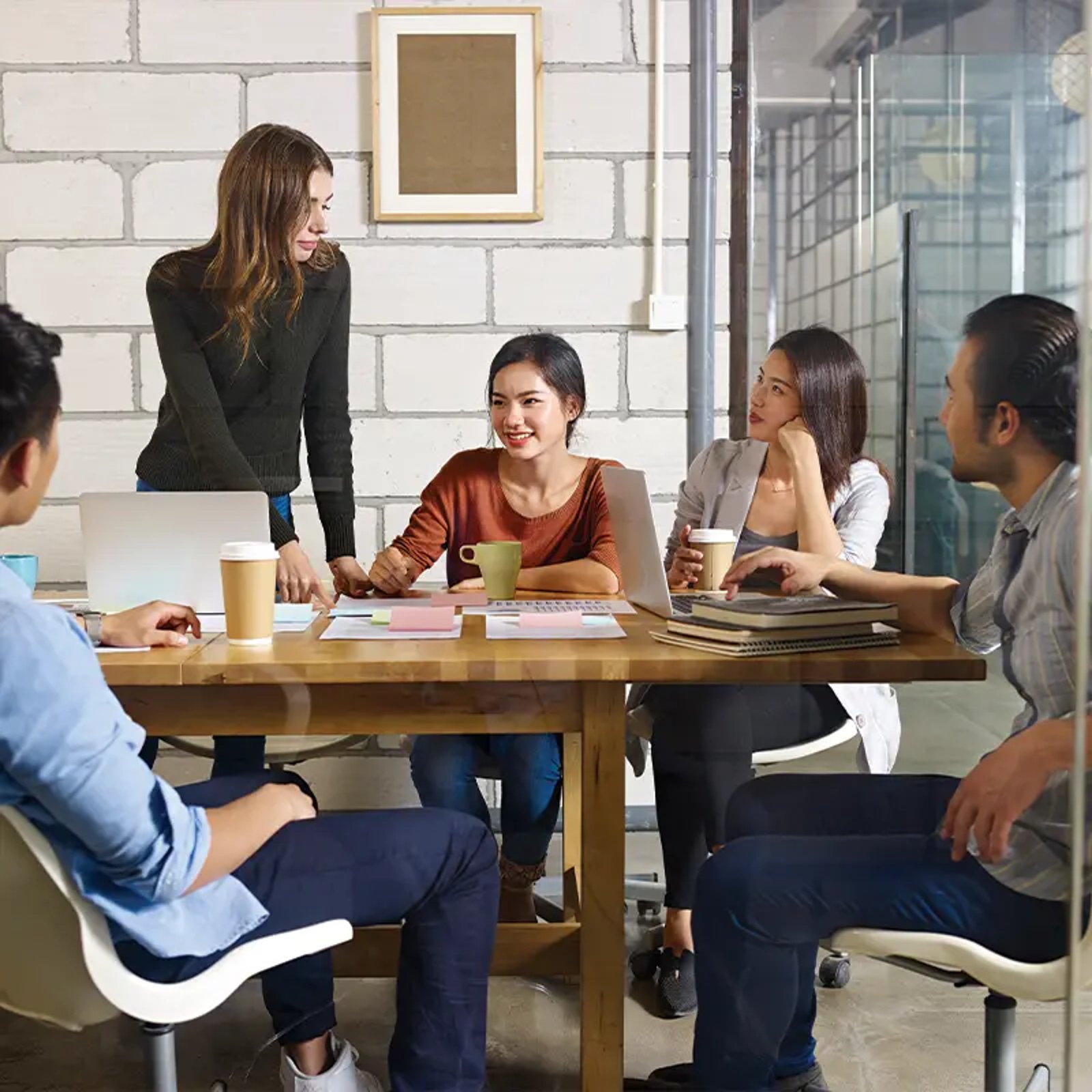 Group of young people having a meeting