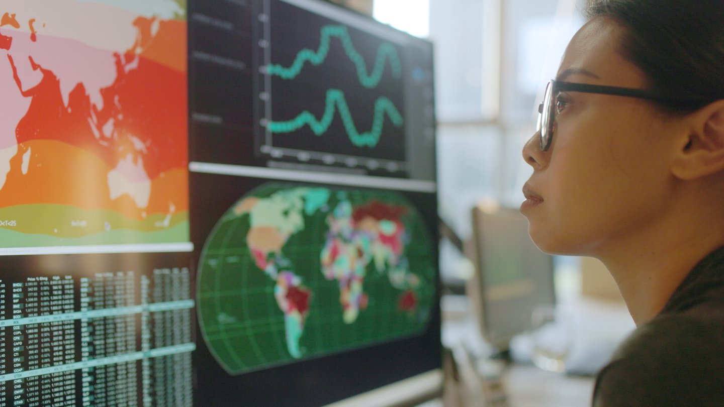 Woman looking through climate data
