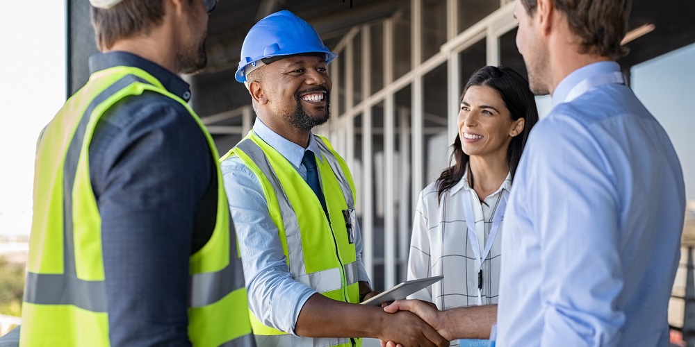 risk manager and client shaking hands