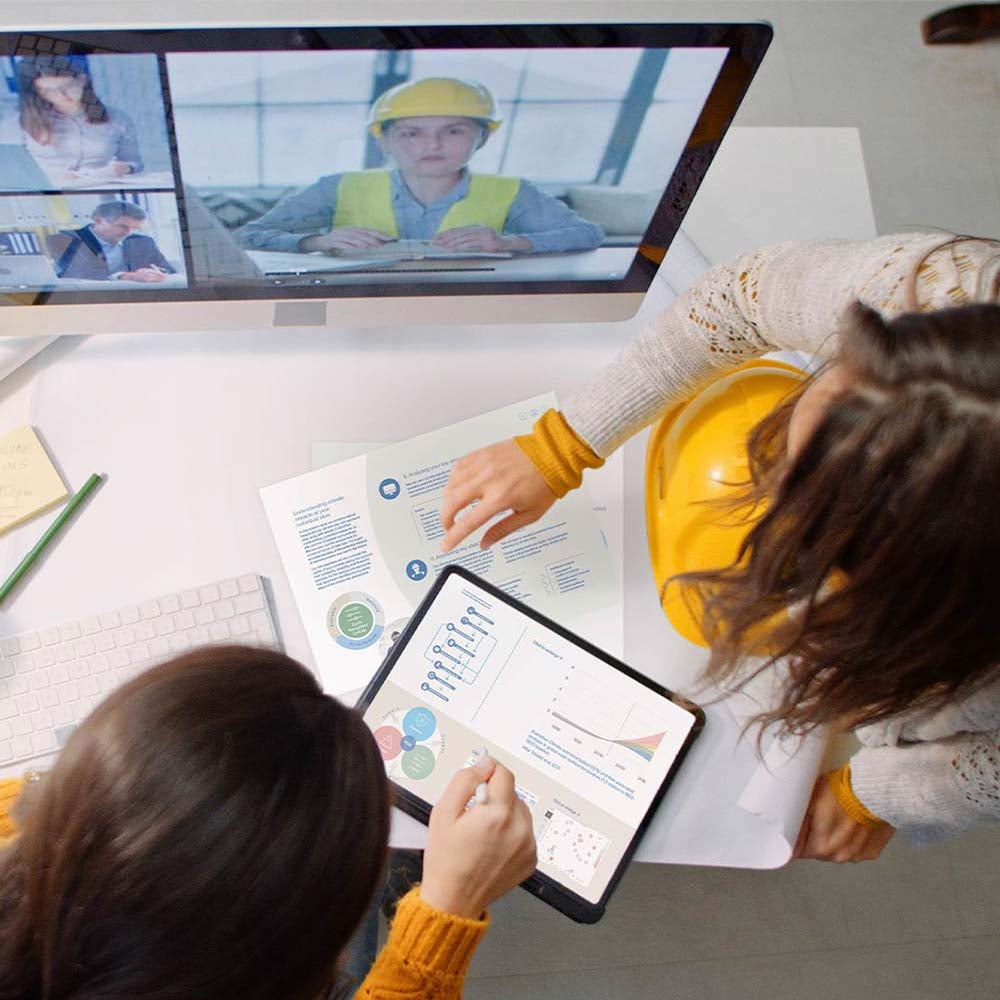 Risk Management: People working with data and video chatting