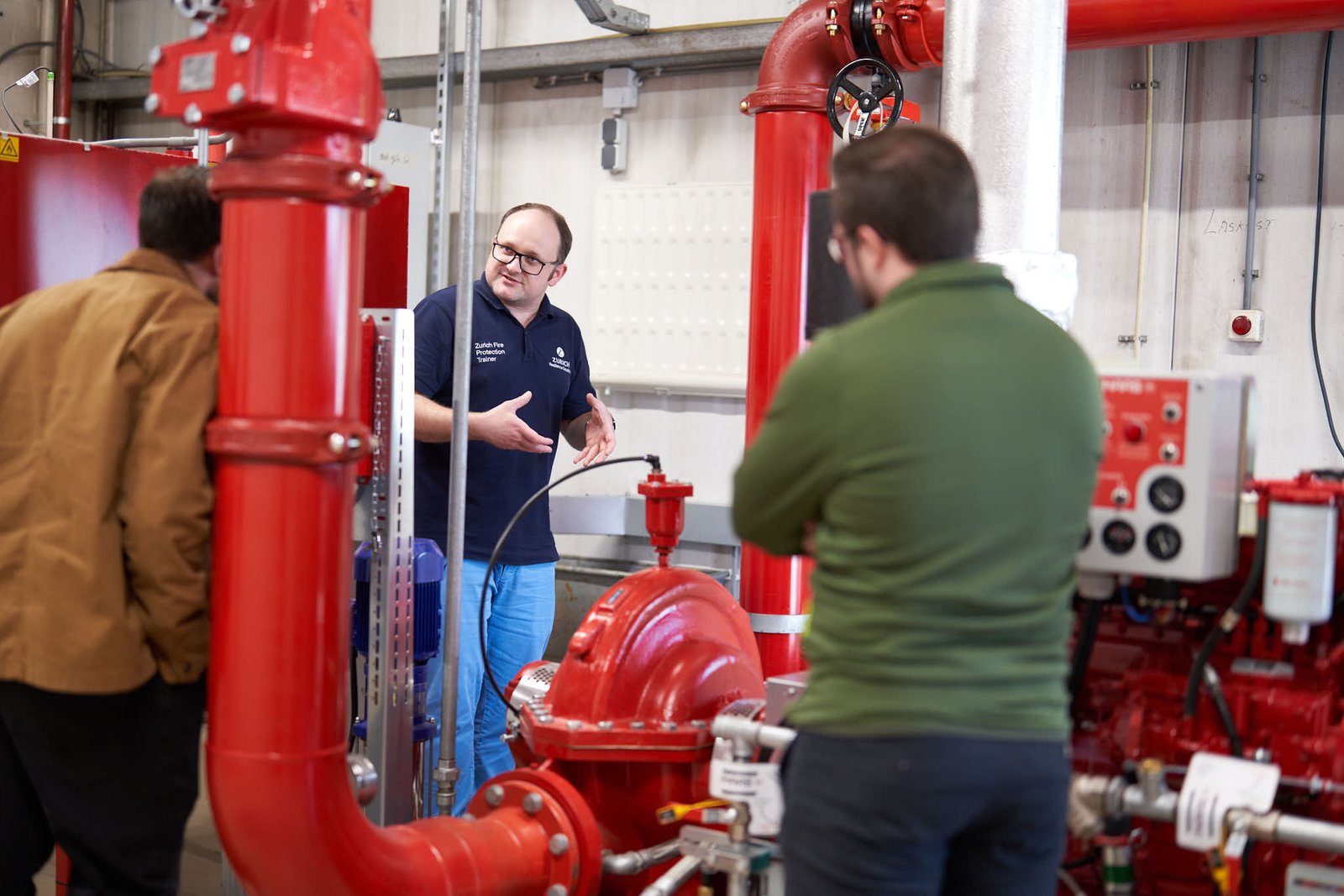 three people talking about fire safety