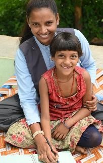 YoungGirl and Kid smiling