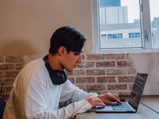 Young man with laptop